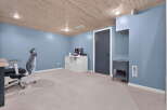 Discover this inviting space featuring a comfortable office chair and a sleek white storage unit, perfect for organization.