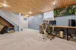 Discover a versatile basement space perfect for a home office or recreation area.