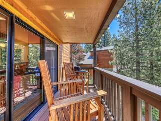 Enjoy the serene mountain views from this charming balcony, perfect for morning coffee or evening relaxation.
