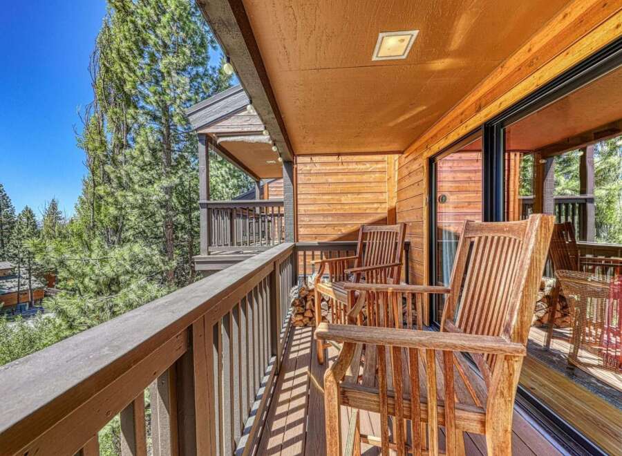 Enjoy breathtaking mountain views from this charming wooden balcony, perfect for morning coffee or evening relaxation.