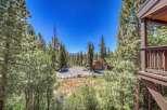 Nestled amidst a lush pine forest, this property offers a serene mountain retreat.