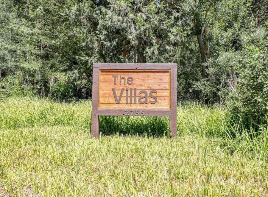 Discover 'The Villas' at 2755, a charming residential community nestled amidst lush greenery.