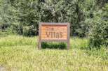 Discover 'The Villas' at 2755, a charming residential community nestled amidst lush greenery.