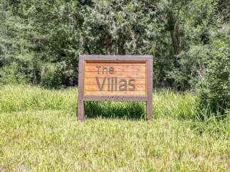 Discover 'The Villas' at 2755, a charming residential community nestled amidst lush greenery.