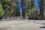 Enjoy outdoor recreation with a private tennis court and a sparkling swimming pool, perfect for active lifestyles.