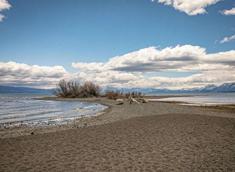 Discover a serene lakeside retreat with this stunning property.
