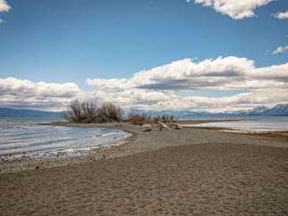 Discover a serene lakeside retreat with this stunning property.