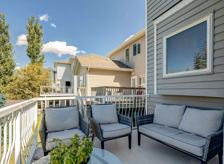 Enjoy outdoor living on this spacious balcony, perfect for relaxing or entertaining.