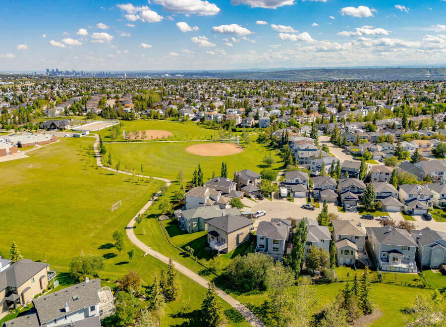 Discover this stunning suburban neighborhood with beautiful homes and lush green spaces.