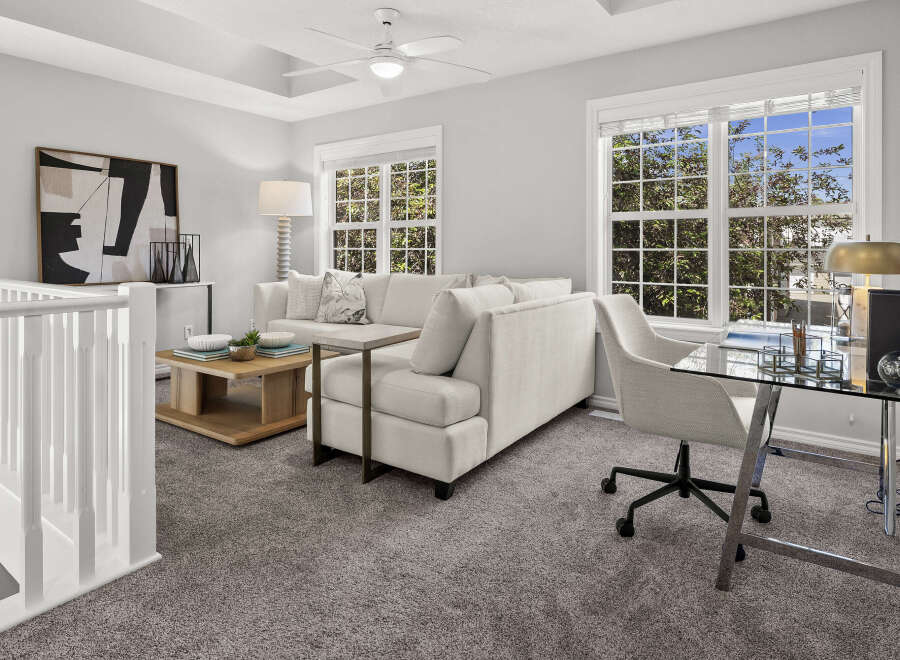 Discover this bright and airy living space, perfect for relaxation and productivity.
