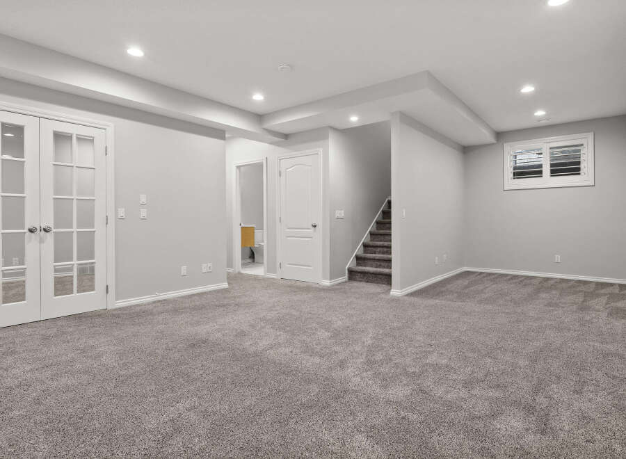 Discover the potential of this unfinished basement, offering a blank canvas for your dream living space.