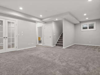 Discover the potential of this unfinished basement, offering a blank canvas for your dream living space.