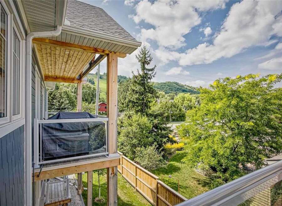 Enjoy outdoor living on this spacious balcony, perfect for entertaining or relaxing with a view.