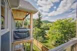 Enjoy outdoor living on this spacious balcony, perfect for entertaining or relaxing with a view.
