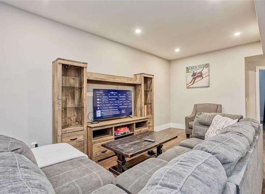Step into this inviting living space, perfect for relaxation and entertainment.