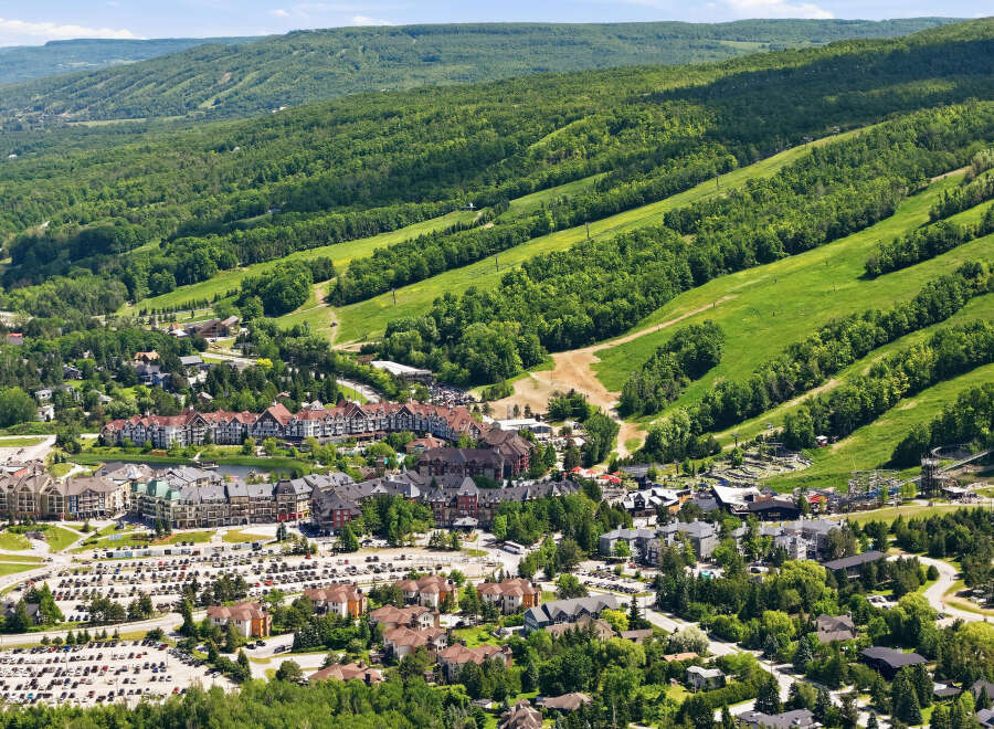 Discover this stunning mountain resort offering a vibrant village with luxurious accommodations and a wide array of recreational activities.