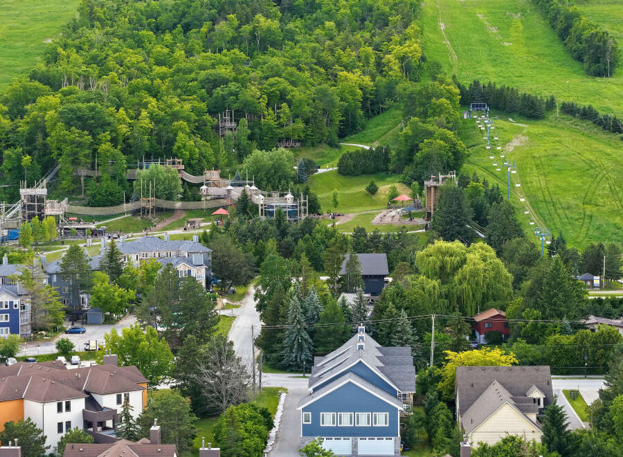 Discover this stunning property nestled amidst lush greenery and scenic mountain views.