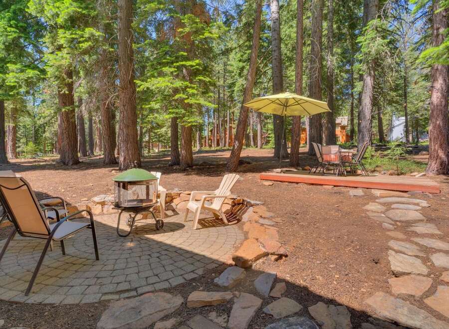 Enjoy the serene mountain lifestyle with this charming outdoor living space, perfect for relaxation and entertaining.