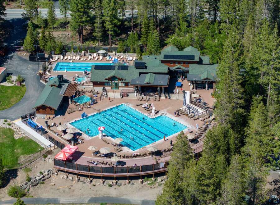 Experience ultimate relaxation and recreation at this stunning resort featuring multiple swimming pools and a hot tub, perfect for families and individuals alike.