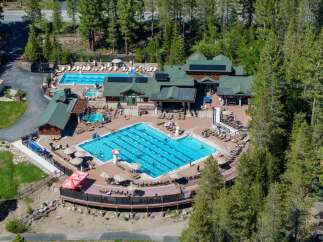 Experience ultimate relaxation and recreation at this stunning resort featuring multiple swimming pools and a hot tub, perfect for families and individuals alike.