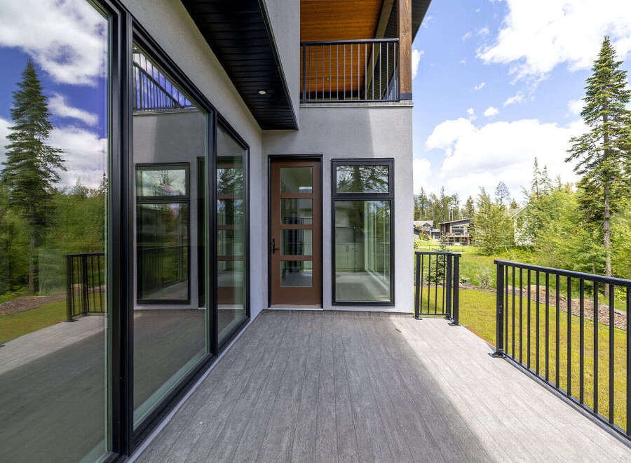 Experience modern living with this stunning property featuring expansive floor-to-ceiling windows that flood the interior with natural light.
