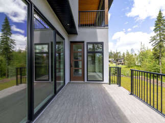 Experience modern living with this stunning property featuring expansive floor-to-ceiling windows that flood the interior with natural light.