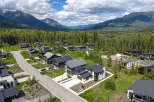 Discover modern luxury living nestled amidst breathtaking mountain scenery.