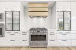 Experience culinary excellence in this modern kitchen, featuring a professional-grade gas range and a sleek, integrated range hood with a warm wood finish.