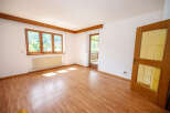 Discover this bright and airy room featuring a large multi-pane window that floods the space with natural light.