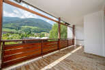Enjoy breathtaking mountain views from this spacious balcony, perfect for outdoor relaxation and entertaining.