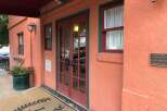 Discover this charming property featuring a welcoming entrance with double doors and large windows, perfect for natural light.