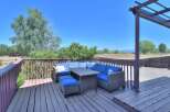Enjoy outdoor living on this spacious deck, perfect for entertaining or relaxing with a view.