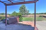 Enjoy outdoor living with this spacious deck and patio area, perfect for entertaining or relaxing.