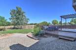 Enjoy outdoor living with this spacious deck and pergola, perfect for entertaining or relaxing.