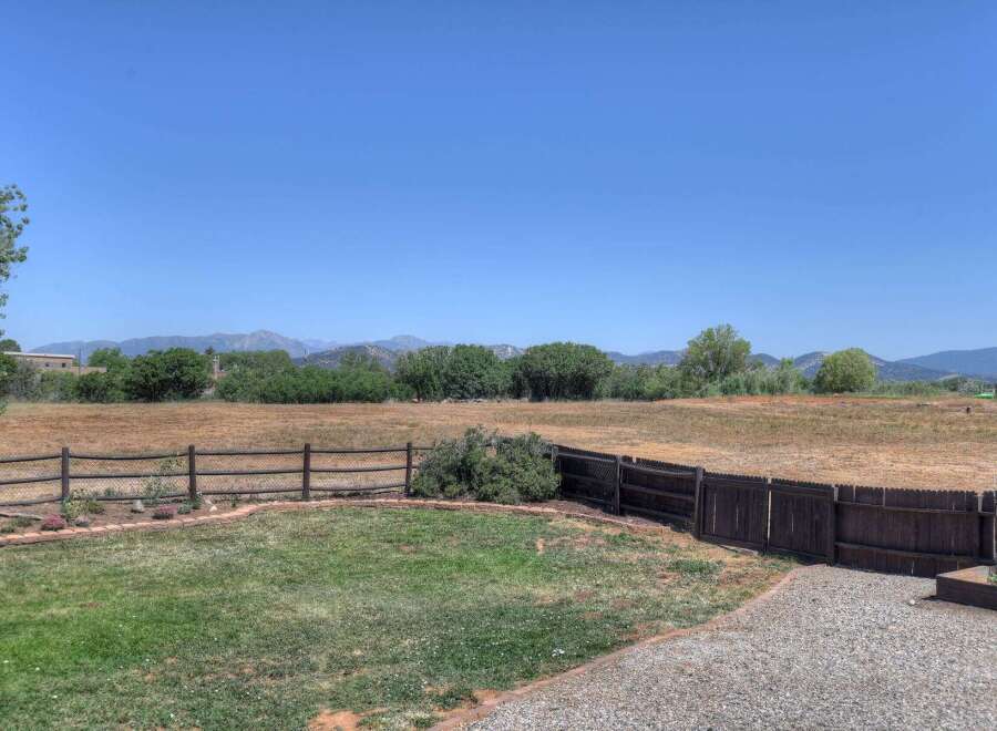 Enjoy breathtaking mountain views from this expansive property, perfect for those seeking tranquility and space.