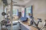 Transform your home into a personal fitness sanctuary with this dedicated gym space.