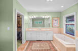 Indulge in this luxurious bathroom featuring a spacious jacuzzi tub perfect for relaxation.