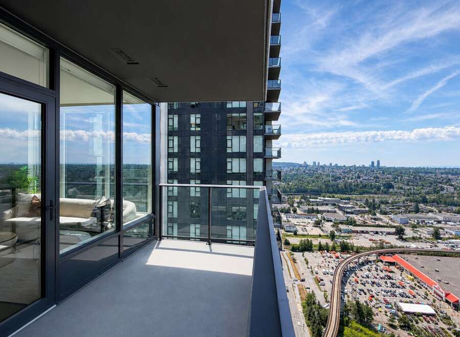 Experience breathtaking city and mountain views from this stunning balcony, perfect for enjoying your morning coffee or evening relaxation.