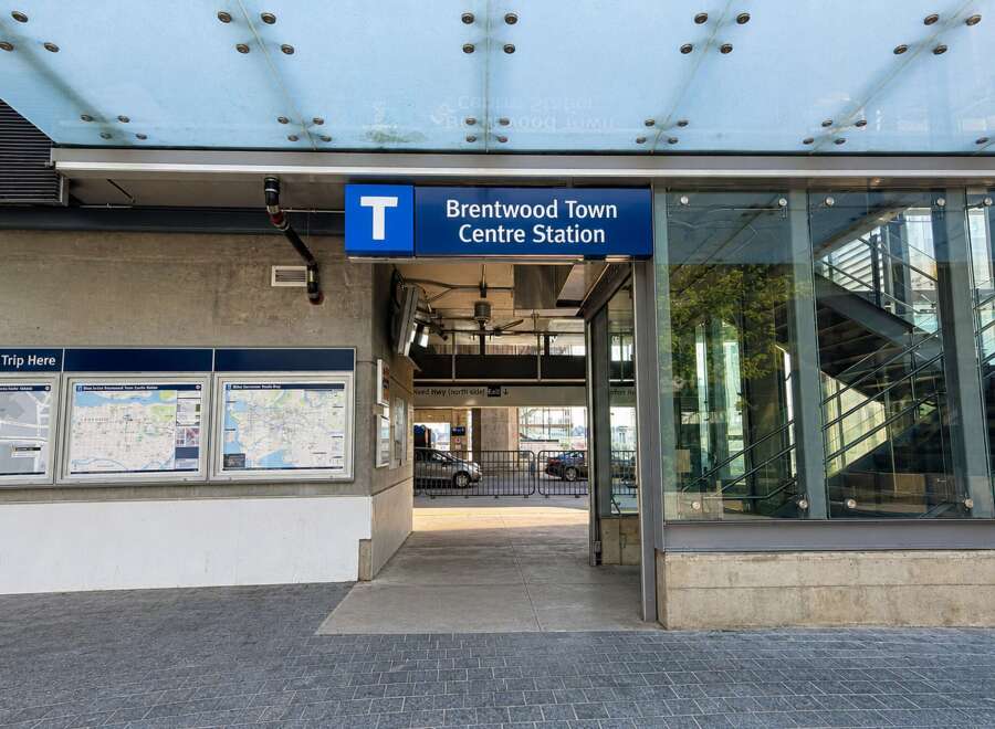 Discover convenient transit access at Brentwood Town Centre Station, featuring clear signage and multiple maps to help you plan your journey.