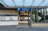 Discover convenient transit access at Brentwood Town Centre Station, featuring clear signage and multiple maps to help you plan your journey.