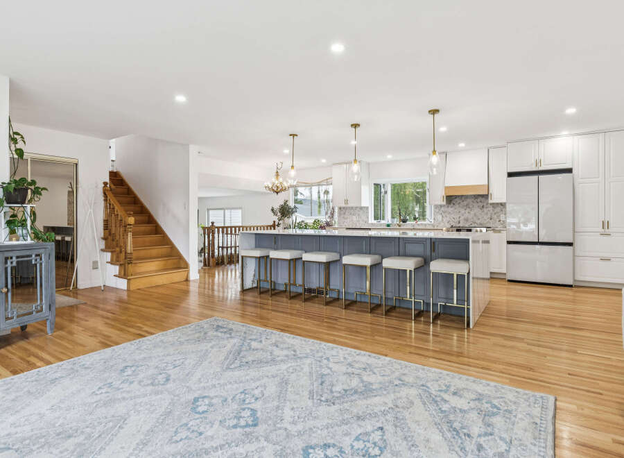 Experience modern living in this stunning open-concept kitchen and living area, perfect for entertaining.