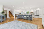 Experience modern living in this stunning open-concept kitchen and living area, perfect for entertaining.