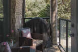 Enjoy outdoor living on this charming patio, perfect for entertaining or relaxing.