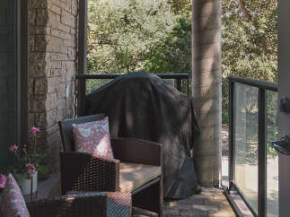 Enjoy outdoor living on this charming patio, perfect for entertaining or relaxing.