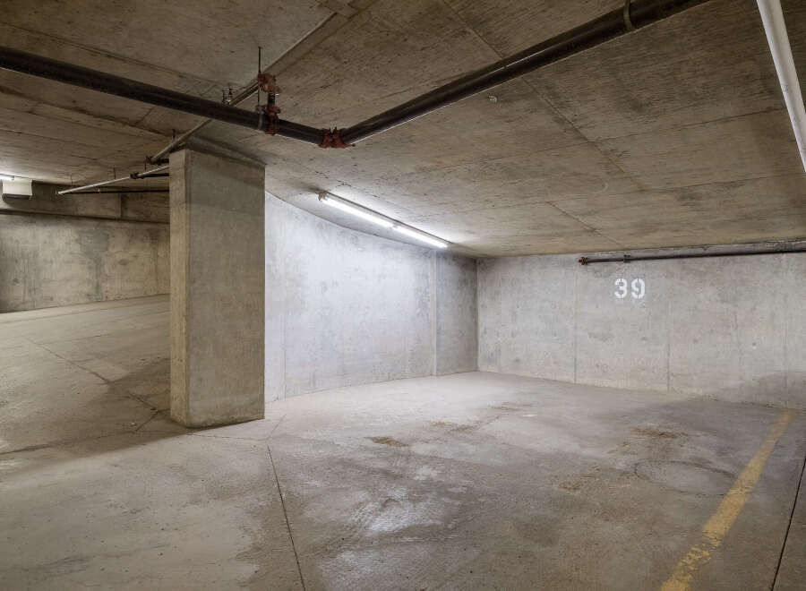 Discover this spacious concrete parking space, perfect for your vehicle.