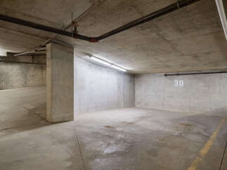 Discover this spacious concrete parking space, perfect for your vehicle.
