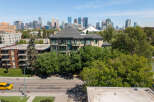 Experience luxury urban living in this stunning apartment complex, offering breathtaking city skyline views.