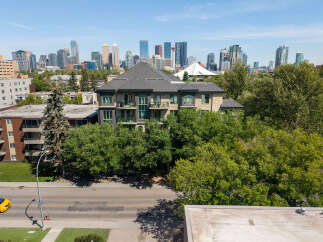 Experience luxury urban living in this stunning apartment complex, offering breathtaking city skyline views.