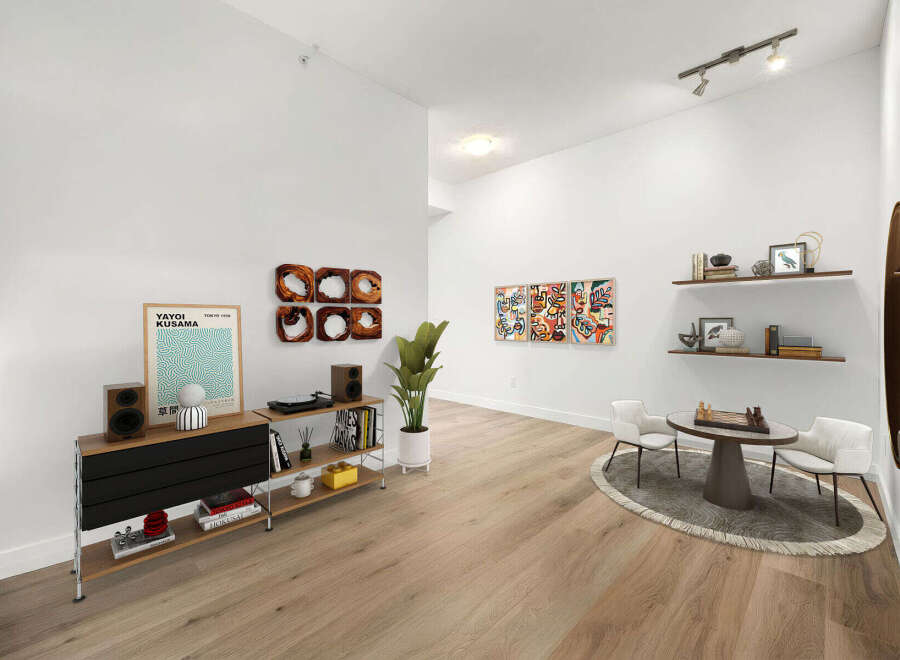 Experience modern living in this stylish apartment, featuring a spacious open-concept living area perfect for entertaining.