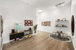 Experience modern living in this stylish apartment, featuring a spacious open-concept living area perfect for entertaining.